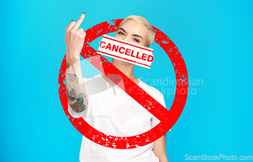 Image of Cancel culture, angry woman and portrait of banned overlay with graphic and rude hand sign. Swear, blue background and cancelled female person with controversy, toxic opinion and censorship letter