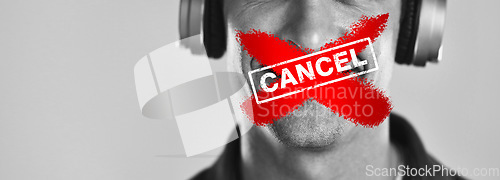 Image of Cancel culture, man mouth and banned overlay with graphic and red cross in studio. Headphones, grey background and cancelled person with silence, toxic influencer opinion and censorship on podcast