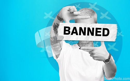 Image of Banner, ban and face of woman with protest for social media bullying, illustration and opinion on abstract blue background. Mockup, person and voice for stop, word overlay and message in studio