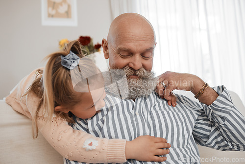 Image of Love, couch, and child hug grandfather in a home for bonding, care and relax together in living room for fun. Senior, sofa and elderly person or grandparent with girl kid as family on retirement