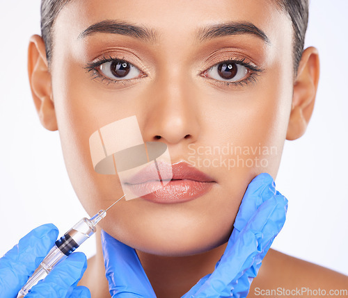 Image of Face, lip filler and dermatology, woman and beauty with doctor and plastic surgery on white background. Portrait, cosmetic treatment and liquid collagen, needle syringe and wellness in a studio