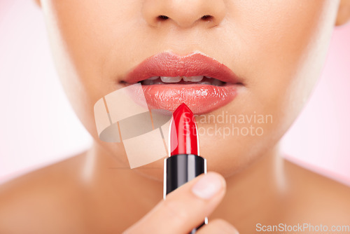 Image of Makeup, mouth and woman with lipstick in studio for application, cosmetic and gloss closeup. Zoom, beauty and female model with color treatment for plump, volume and smooth lips texture promotion