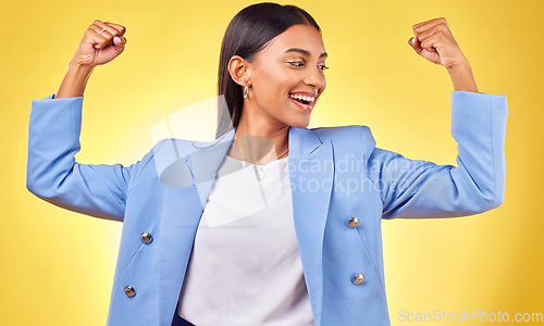 Image of Flex, success and happy with business woman in studio for pride, professional and champion. Empowerment, power and strong with person on yellow background for celebration, achievement and winner