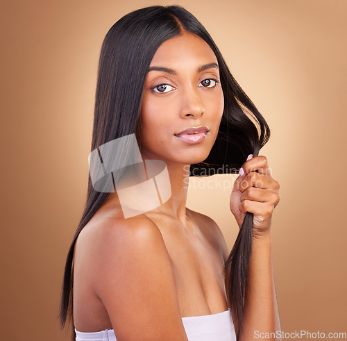Image of Beauty, hair and health with portrait of woman in studio for keratin, salon treatment and texture. Shampoo, cosmetics and growth with face of model on brown background for glamour, shine or hairstyle