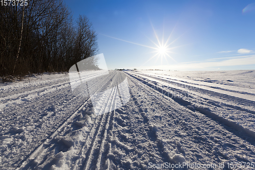 Image of winter road with ruts