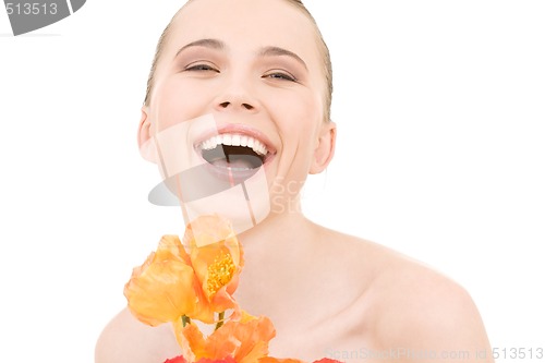 Image of laughing woman with flowers