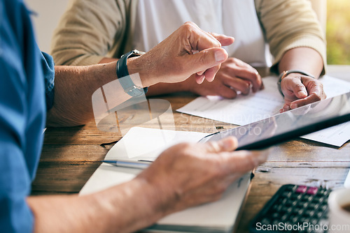 Image of Closeup, hands and couple with a tablet for planning, mortgage payment or home budget. Debt, website and people or family with technology and documents for insurance, investment or finance savings