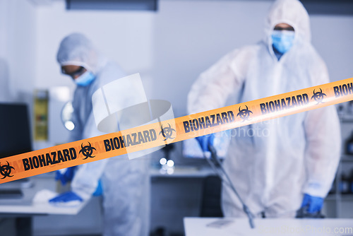 Image of Hazard, tape and people in danger working with toxic, biology or team disinfect dangerous bacteria or health emergency. Biohazard, protection and medical staff in hazmat suit cleaning for bio safety