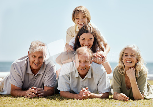 Image of Happy family, picnic and grandparents with child and parents on tropical vacation or outdoor holiday for bonding. Portrait, smile and kid with grandfather travel with mother, father and grandmother