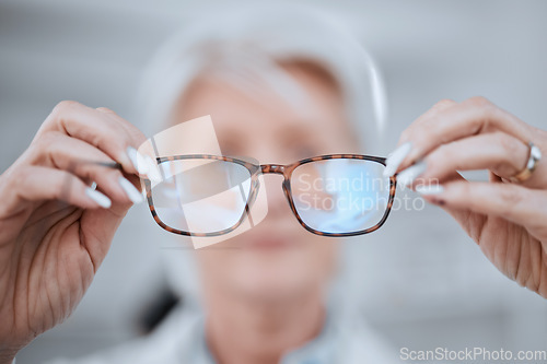 Image of Optometry, consulting and pov with doctor and glasses for vision, eye care and assessment. Help, healthcare and wellness with closeup of person in clinic for shopping, insurance and ophthalmology