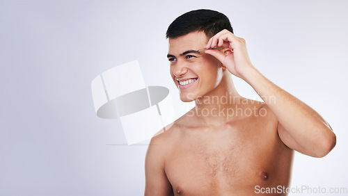 Image of Man, tweezer and clean skincare with facial and beauty treatment for grooming and wellness in studio. Male model, dermatology and hair removal tool for eyebrows with white background and mockup space