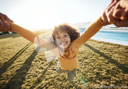 Image of Swing, pov portrait of girl and hands of parent in garden, spinning and circle movement kid on grass of home for play, love and happiness. Smile, relax and person flying for game and freedom