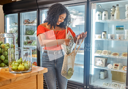 Image of Woman, shop and customer with grocery for bag, food and happy for shopping with zero waste in eco friendly supermarket. Sustainable, retail store and African person with healthy fruits and vegetables