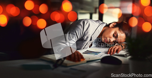 Image of Business woman, sleep and office in night, tired and bokeh with burnout, stress or deadline for financial report. Accountant, audit and fatigue at desk for proposal, project or rest in dark workplace