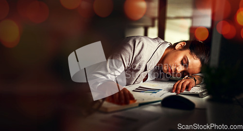 Image of Business woman, sleep and desk in night, tired and bokeh with burnout, stress and deadline in modern office. Accountant, audit and fatigue at desk for proposal, project or rest in dark workplace