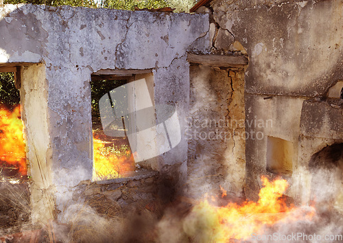 Image of Disaster, damage and fire with house and smoke from danger, chaos accident and devastation. War, crisis and abandoned with broken building structure for grunge, construction and military attack