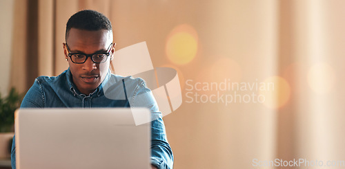 Image of Laptop, bokeh and black man typing in office with mockup space and business communication on email. Networking, research or businessman checking website for an update or article online in workplace