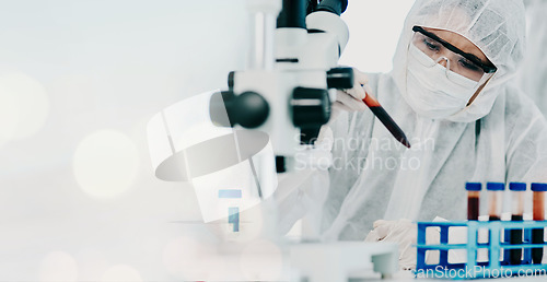 Image of Science, blood sample and scientist in a hazmat suit doing research, experiment or study on dna. Pathology, professional and researcher working with rna vials for medical innovation in a laboratory.