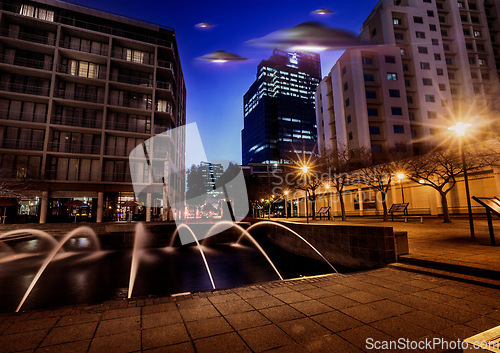 Image of Ufo, alien mission and city at night with spaceship for science fiction and fantasy in sky with surreal glow. Spacecraft, mystery and flying saucer from outer space for discovery and invasion