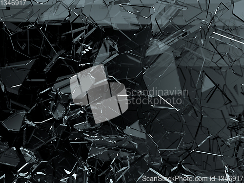 Image of Pieces of glass broken or cracked on black