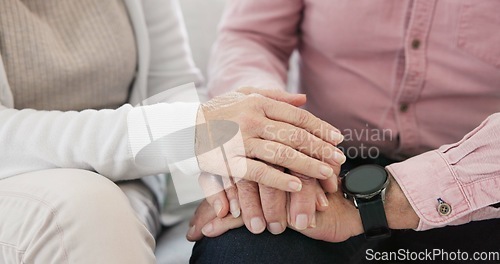 Image of Closeup of senior couple holding hands for love, care and trust in retirement. Old man, woman and helping hand for loyalty to partner in kindness, hope and support to forgive, with empathy at home