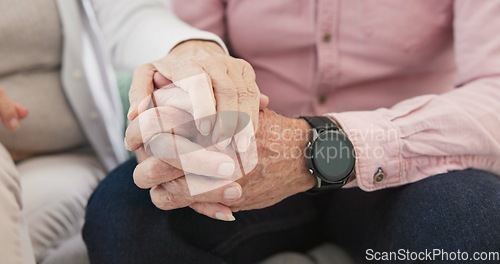 Image of Closeup of old couple, man and woman holding hands for love, care and trust in retirement. Senior partner, loyalty and helping hand for kindness, sorry and support to forgive, hope or empathy at home