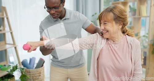 Image of Physiotherapy, fitness and senior woman with black man and dumbbell for body assessment. Physical therapy, weightlifting and elderly female with therapist for recovery, training and healing exercise