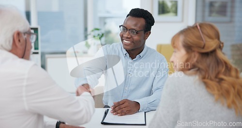 Image of Senior couple, insurance agent and handshake with planning and investment at meeting. Finance, shaking hands and agreement deal for accounting and retirement budget for income savings with thank you