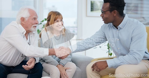 Image of Senior, couple and handshake for life insurance planning and investment at a meeting. Finance, shaking hands and agreement deal for accounting and retirement budget for income savings with thank you