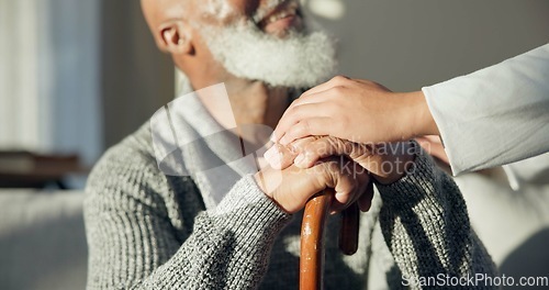 Image of Support, walking stick and hands of senior man with a cane for help, support and old age caregiver care for patient. Healthcare, empathy and elderly person in a nursing home for medical health