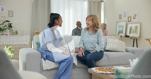 Image of Medical, support and friends with nurse with old woman on sofa for empathy, volunteer or trust. Healthcare, retirement and rehabilitation with senior patient and caregiver in nursing home for healing