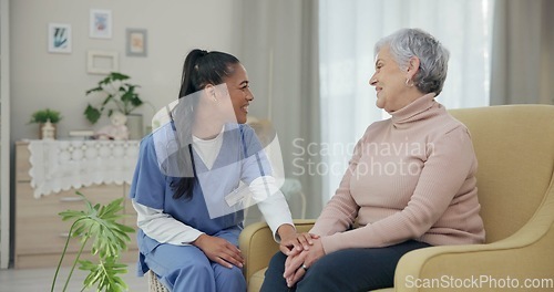 Image of Holding hands, support and happy with nurse with old woman on sofa for empathy, medical and trust. Healthcare, retirement and rehabilitation with patient and caregiver in nursing home for healing