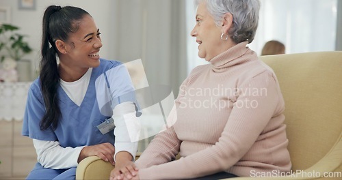 Image of Medical, holding hands and happy with nurse with old woman on sofa for empathy, support and trust. Healthcare, retirement and rehabilitation with patient and caregiver in nursing home for healing