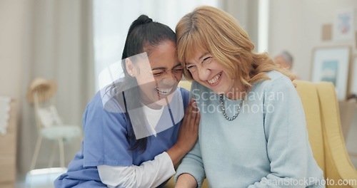 Image of Medical, support and laugh with nurse with old woman on sofa for empathy, volunteer and trust. Healthcare, retirement and rehabilitation with senior patient and caregiver in nursing home for healing