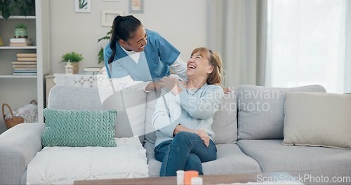 Image of Caregiver, conversation and happy elderly woman speaking, chat and discussion about support, senior care or health service. Retirement healthcare, nursing home help and nurse talking to relax patient