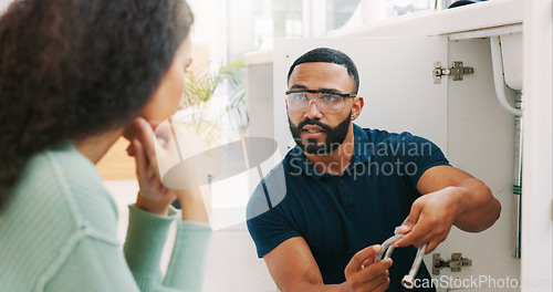 Image of Plumber black man, woman and maintenance talk in kitchen for sink pipe with customer support in home. Entrepreneur handyman, plumbing or small business owner with consulting for fixing water system