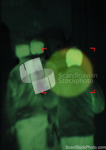 Image of Military, enemy and target in night vision, overlay or dark green silhouette of spy, agent or terrorist risk to soldier. Police, surveillance and security people in infrared scope for army mission