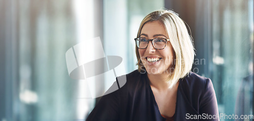 Image of Face, smile and mockup with a designer woman in a creative, professional or modern workplace. Vision, thinking and space with a happy young design employee in her office boardroom for planning