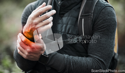 Image of Wrist, pain and hands of man in sports, outdoor and hiking with a medical accident, crisis or problem with anatomy in red glow. Training, injury and athlete or trauma to muscle, joint or hand