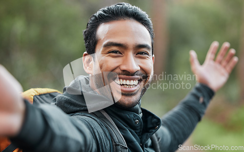 Image of Hiking man, selfie and smile outdoor with pride, show environment and adventure in forest for wellness. Guy, photography and memory with profile picture, live streaming or post on social network