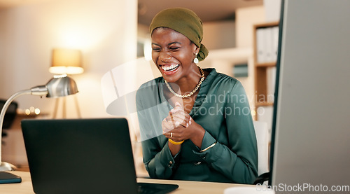 Image of Winning, yes and happy woman on laptop in night news, international success or Nigeria business celebration. African person or winner fist pump for stock market, trading or career bonus on computer