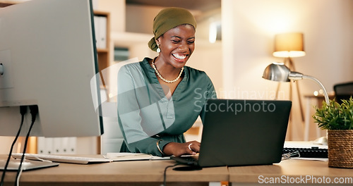 Image of Winning, yes and happy woman on laptop in night news, international success or Nigeria business celebration. African person or winner fist pump for stock market, trading or career bonus on computer