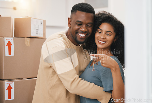 Image of Happy black couple, keys and real estate for new home, property or investment in goals or mortgage together. Excited man and woman holding access to house, apartment or building for room or rent