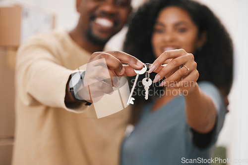 Image of Happy couple, hands and keys in real estate, new home or property for investment, goals or mortgage together. Closeup of man and woman holding access to house, apartment or building for room or rent