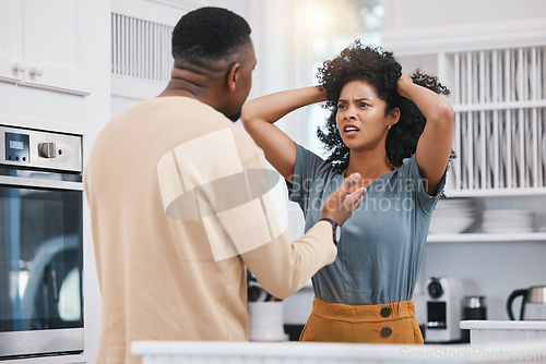 Image of Stress, divorce and couple fighting in a kitchen with anxiety, debt or erectile dysfunction at home. Marriage, doubt and man with woman in a house for conflict, argue or liar, cheating or infertility