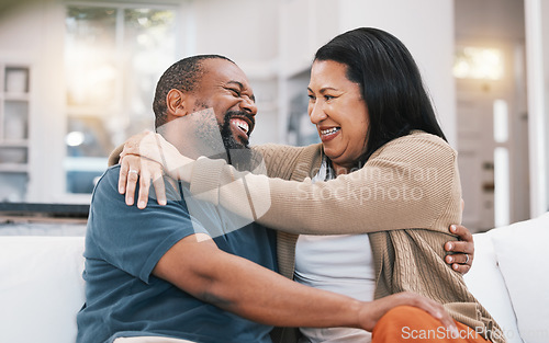 Image of Happy, hug and mature couple on sofa in living room for bonding, healthy relationship and marriage. Love, home and happy black man and woman embrace on couch for relaxing, happiness and commitment