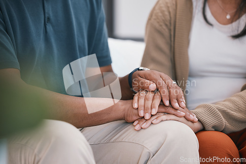 Image of Support, love and couple holding hands closeup with hope, trust and kindness at home. Empathy, zoom and man with woman in a living room with comfort, trust and understanding in infertility crisis