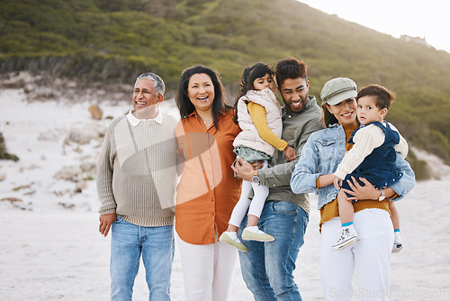 Image of Happy, big family and portrait of vacation on beach with children, parents and grandparents together with love and freedom. Rio de janeiro, holiday and people with support and happiness in nature