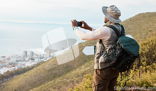 Image of Phone, hiking and photography of black man in nature, adventure and travel on holiday vacation. Mobile, picture of city and person trekking outdoor, tourist journey and view of countryside landscape