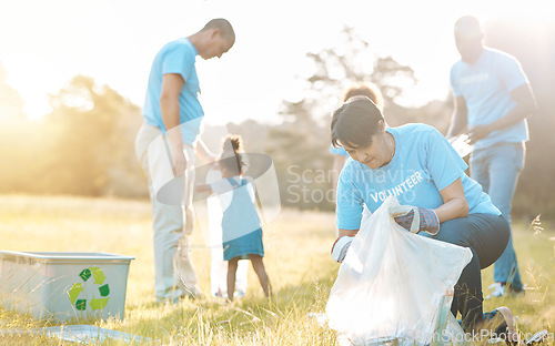 Image of Nature recycling, community volunteer and people cleaning garbage pollution, waste and team environment care. Teamwork, NGO support and eco group helping with park clean up, outreach project or trash